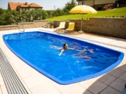 Стъклопластов басейн Orion 7,50 × 3,50 м в градина