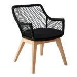 Black Olivia garden armchair with wicker, teak legs and a dark cushion