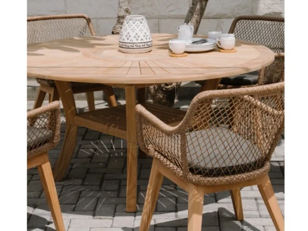 Top, rotating center and shelf of a Colosseum round garden table, close-up