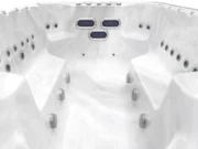 Lengthwise view of an Aquas swim spa toward the three oval jets at the end