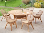 Colosseum round garden table with light Olivia armchairs, flowers and juice