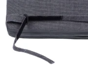 Hook-and-loop strap with a plastic ring on the bottom edge of an Avantgarde cushion