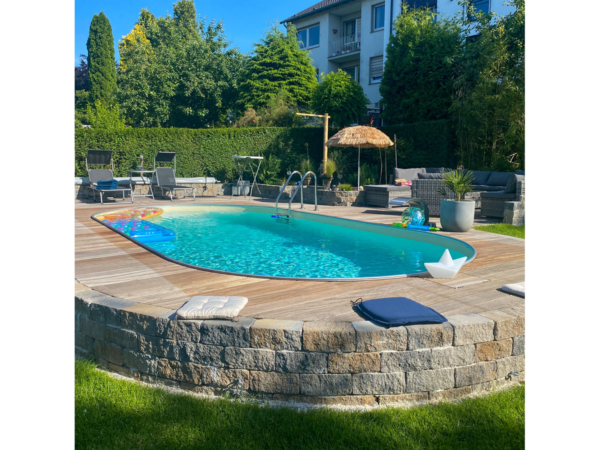 Овален басейн Poolsana 7,00×3,50 м с каменна стена
