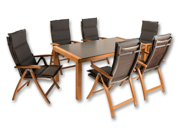 Six garden chairs with Graphite cushions around a rectangular table with a dark top