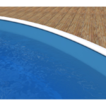 Lagoon blue liner at the edge of a round pool with a wooden deck