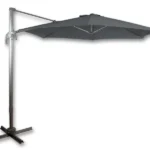 Gray Santorini cantilever umbrella with a 3 m diameter, open, on a cross-shaped base