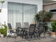 Terrasse mit Esstisch und klappbaren Sesseln Essence mit Teak-Armlehnen