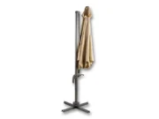 Closed natural Santorini umbrella – the folded canopy stands next to the pole